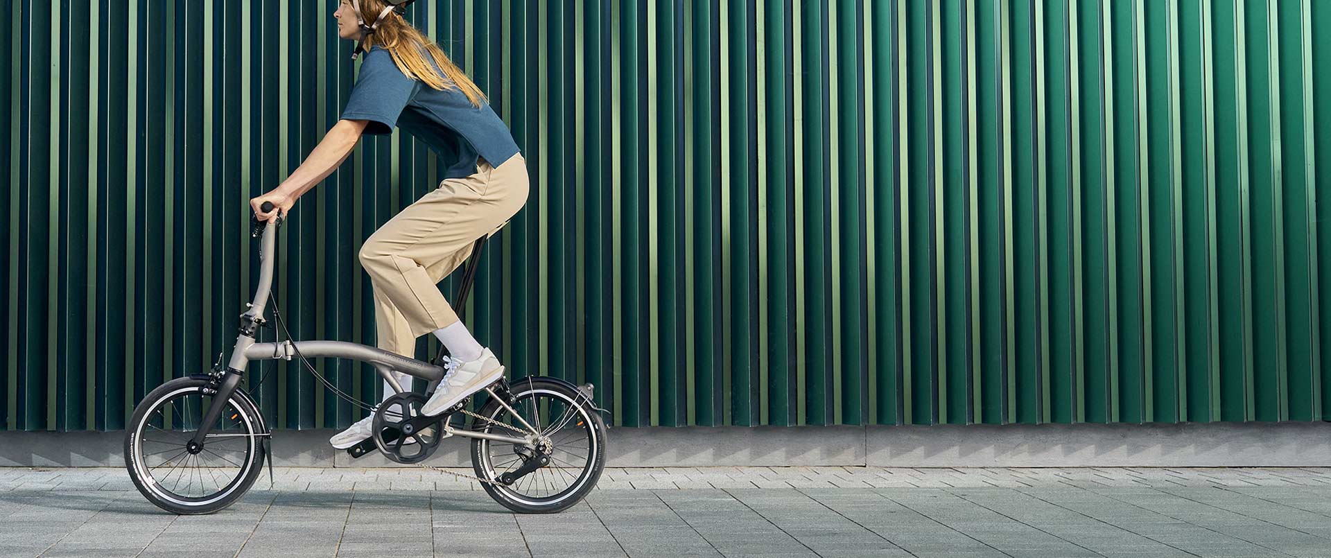 A man riding a Brompton T Line
