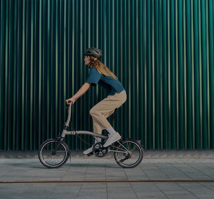 A man riding a Brompton T Line