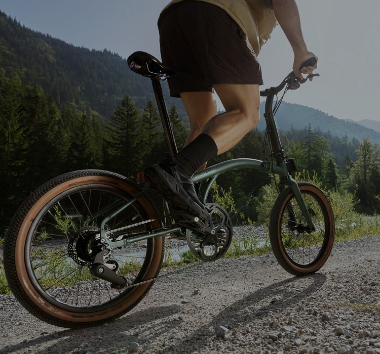 A man riding the G Line on a country road
