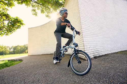 person riding a lunar ice brompton p line