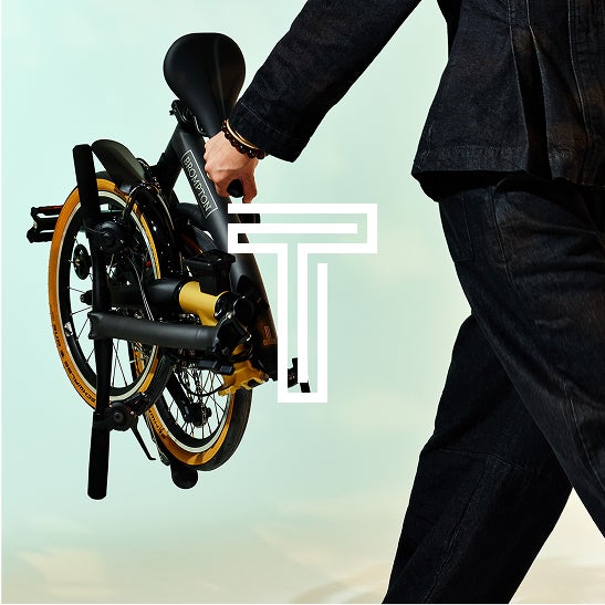 T Line bike with T logo overlaid