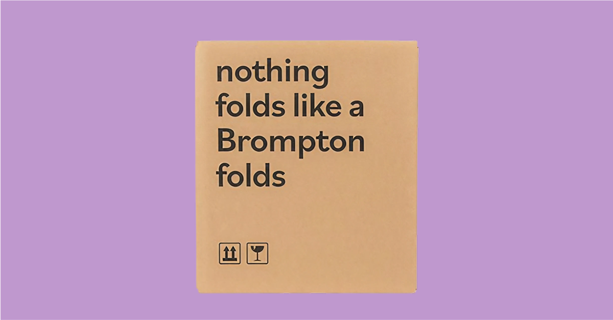 Brompton box on lilac background